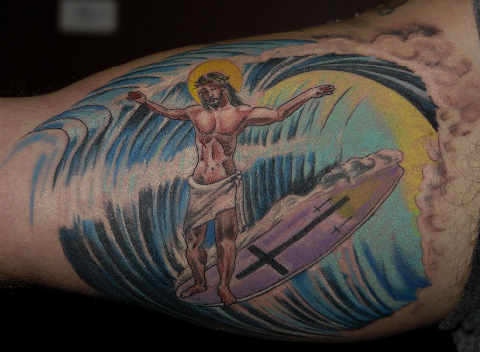 Surf tattoo. Nice idea, but the photo is a bit indistinct.